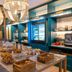 Breakfast buffet at Puente Colgante Boutique Hotel in Portugalete with pastries and hanging lights