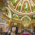 Guangzhou Phoenix City Hotel in Guangzhou with a grand painted ceiling and ornate arched lobby
