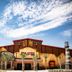 Pinnacle Port A-305 in Panama City Beach, exterior with pirate-themed facade and palm trees