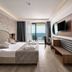 Grand Uysal Apart Hotel in Alanya room with balcony sea view, king bed and TV