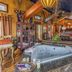 Come Friday Cottages on the Bay in Bacliff, rustic suite with a jetted hot tub and eclectic decor