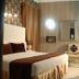 Royal Palace Luxury - Piazza di Spagna, Rome: stylish guest room with bed, desk, chair and wall mirror