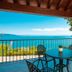 Domina Borgo degli Ulivi - Garda Lake terrace with table and chairs overlooking Lake Garda in Gardone Riviera