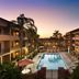 Courtyard by Marriott Fort Myers Cape Coral pool courtyard at sunset in Fort Myers