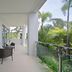 Bangtao Tropical Residence Resort & Spa in Choeng Thale balcony with wicker chairs and tropical garden view