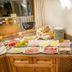Breakfast buffet at Haus Sonnwend in Alpbach with pastries, fruit, cold cuts and toaster