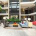 The Burgundy Hotel, Tapestry Collection by Hilton in Little Rock atrium lobby with seating and skylight