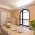 Ristorante Hotel Lucia, Giulianova: bright hotel lounge with table, chairs, arched window and hallway view