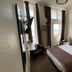 Alexander's, Hastings hotel room with double bed, TV, and sea view through the window