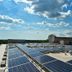 Holiday Inn St Louis Sw - Route 66 By IHG rooftop solar panels under a blue sky in St. Louis