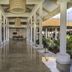 Hyatt Regency Grand Reserve Puerto Rico in Rio Grande: covered open-air resort corridor with polished floor