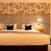 Greswolde Arms by Chef & Brewer Collection in Solihull bedroom with king bed and floral wallpaper