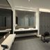 Hotel Grandhika Iskandarsyah Jakarta modern bathroom with double sinks, large mirror, and glass shower stall