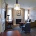 Residence Inn by Marriott La Mirada Buena Park suite with fireplace, seating area and bedroom doorway in La Mirada