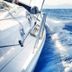 La Maison Ottomane in Chania: sailboat cruising on blue sea with distant mountains