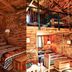 Grand Canyon Western Ranch in Meadview: rustic log cabin room with loft bed and wooden furnishings
