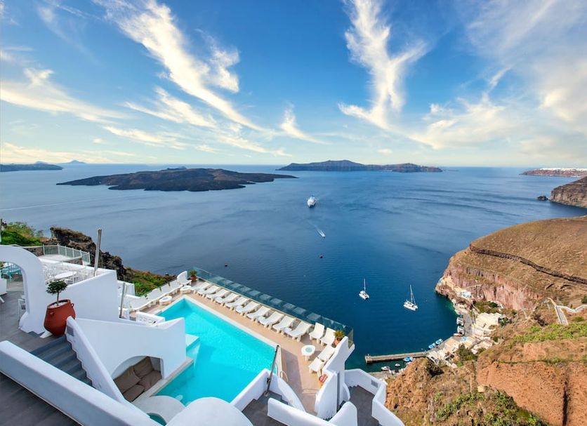 Athina Luxury Suites in Thera with infinity pool overlooking the caldera and sea