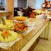 Rede Andrade Atlântico in Piçarras breakfast buffet with fruit platters and pastries
