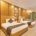 Sterling Amargarh Jodhpur guest room with two beds, desk, and garden-view windows in Jodhpur