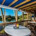 Trianon Bonita Bay Hotel in Bonita Springs with lakeside patio dining and water views