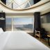 JK Hotel, Busan room with bed, large windows and harbor view