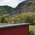 Hotel Kachelburg in Dieblich with terrace view of green hills and a river valley