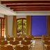 Sheraton Mallorca Arabella Golf Hotel in Palma de Mallorca meeting room with rows of chairs and garden-view windows