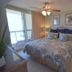Pelican Beach Resort & Conference Center in Destin bedroom with balcony and ocean view