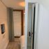 Self Contained Rooms in Central Torquay bedroom with bed, mirror and window blinds in Torquay
