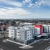 Residence Inn by Marriott Denver Aurora exterior with modern low-rise building and mountain views