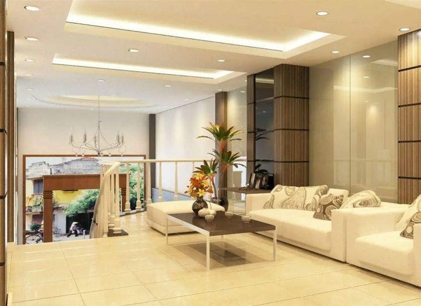 Hanoi Crystal Hotel lobby in Hanoi with white sofas, coffee table, and mezzanine view