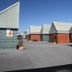 193 Aorangi Manor Motel in Blenheim courtyard with brick motel units and peaked metal roofs
