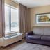 Extended Stay America Suites - Los Angeles - Torrance Blvd room with sofa, lamp, and window view in Torrance