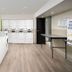 Woodspring Suites Indianapolis Castleton laundry room with washers, dryers and folding table