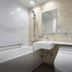 Daiwa Roynet Hotel Yokohama-Koen bathroom with bathtub, shower, sink and toilet in Yokohama