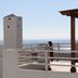 Aparthotel Vistamar in San José with ocean-view rooftop terrace and white railings