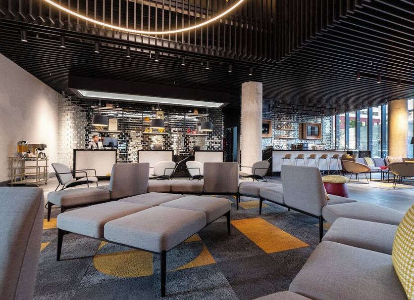 Ola Santiago Providencia, Tapestry Collection by Hilton lobby lounge with modular seating in Santiago