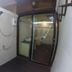 Lipe Sunset Beach Resort in Ko Lipe outdoor shower area with sliding glass door