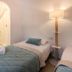 Agroturismo Ca Sa Vilda Marge room in Sant Joan de Labritja with twin beds and a floor lamp