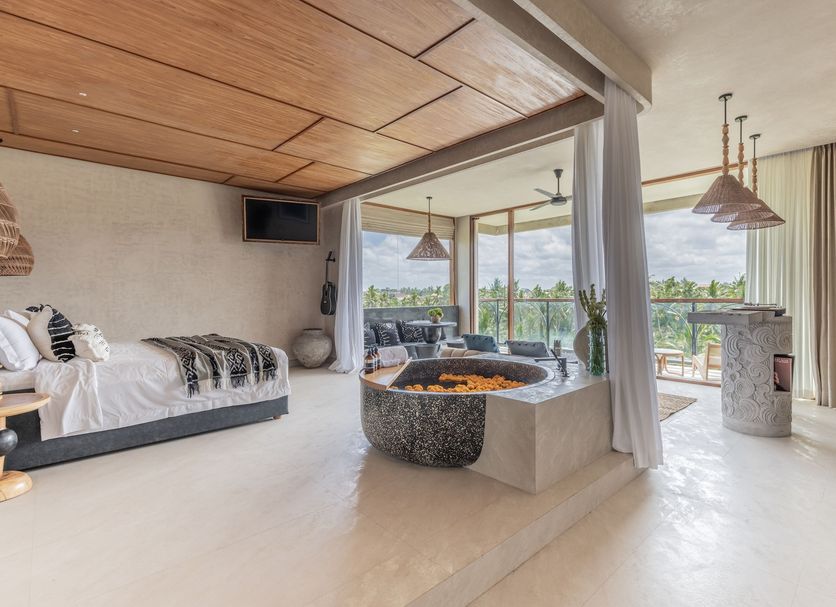 Soulshine Bali Ubud room with fire pit and balcony overlooking lush tropical views