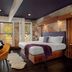 The Horton Hotel, Boone guest room with king bed, desk, and large windows