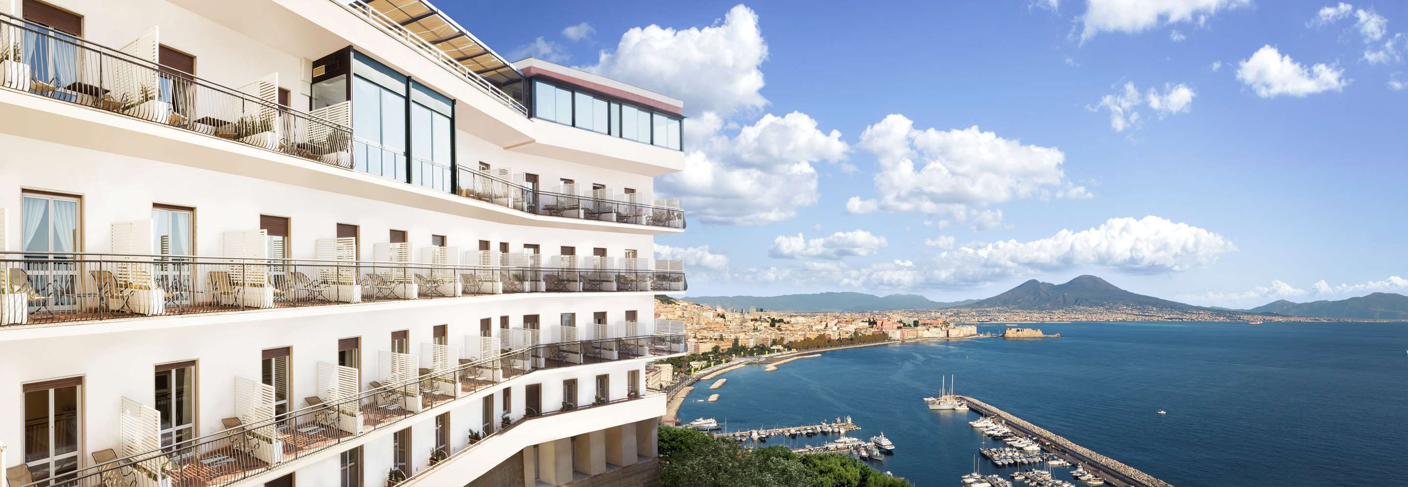 Hotel Paradiso, BW Signature Collection in Naples with balconies overlooking the bay and city skyline