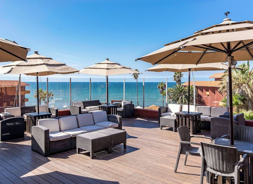 Puerto Nuevo Baja Hotel & Villas rooftop terrace with lounge seating and ocean views in Puerto Nuevo