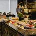 Courtyard by Marriott Seoul Myeongdong buffet spread with sushi, salads and desserts in Seoul
