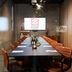 Meeting room at Hotel Guestapart in Aarhus with long conference table and orange chairs