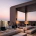 Rooftop terrace at The Tess, Autograph Collection in Atlanta with lounge seating and city skyline views
