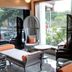 Hotel Grand Marian in Ludhiana lounge seating with wicker chairs and large window view