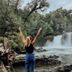 Termas Puyehue Wellness & Spa Resort in Puyehue, guest admiring waterfall and river landscape
