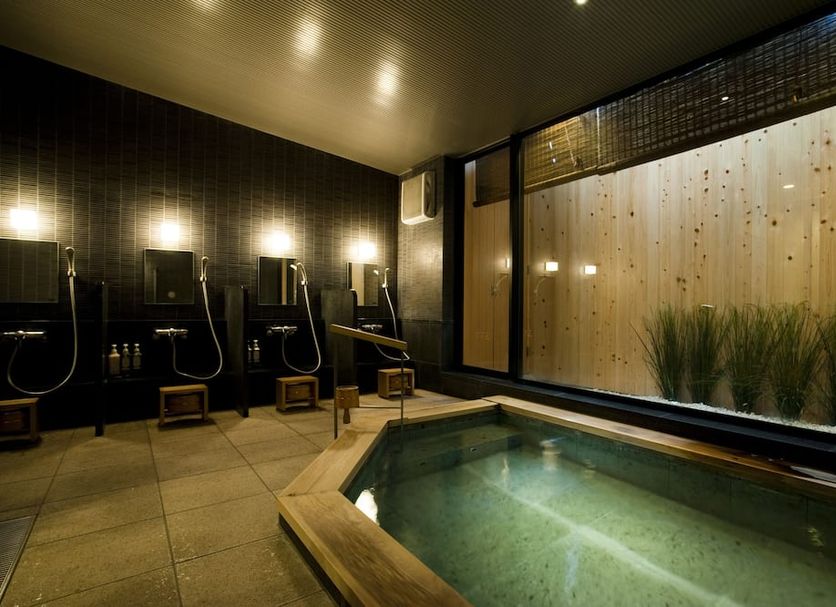 Ochanomizu Hotel Shoryukan in Tokyo features an indoor soaking pool and tiled bathing area