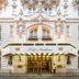 Hotel Monteleone in New Orleans, ornate historic facade with grand entrance and flags